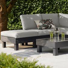 Outdoor cushions drying upright in a ventilated shaded area