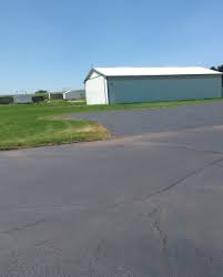 Blacktop patching material can't solve every problem. Summer Is Asphalt Driveway Repair Time
