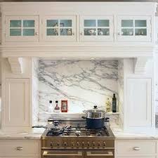 Marble Spice Shelf With Metal Brackets Over Cooktop Transitional Kitchen Kitchen Design Shaker Kitchen Cabinets White Kitchen Backsplash