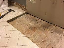 Tips for plywood subfloor installation. What Is The 2 Inch Layer Of Masonry Under My Bathroom Tile Home Improvement Stack Exchange