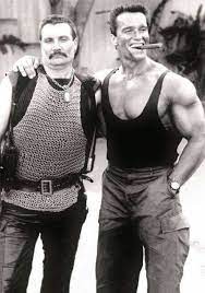 7.5 x 5.25 x 0.5 inches; Schwarzenegger And Vernon Wells On The Commando 1985 Set Arnold Schwarzenegger Schwarzenegger Movies Schwarzenegger