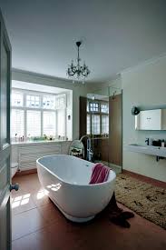 If you use the same tiles on your floor as your walls it visually expands the space, and medium to large tiles are better as small or mosaic tiles can make the bathroom look even smaller. Terracotta Floors Interior Design Ideas Ofdesign