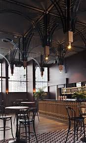 Industrial Design Wall Restaurant Interiors In The Picture There Is A Room That Has A Very Attr Cafe Bar Design Interior Architecture Design Hotel Interiors