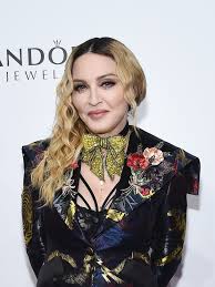 Stream tracks and playlists from madonna on your desktop or mobile device. Madonna Shares Throwback Photo With Her Natural Hair Color Pictures Allure