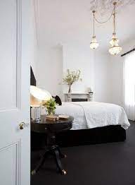 5 Vintage Design Trends That Are Making A Comeback Domino Contemporary Bedroom Bedroom Carpet Dark Carpet