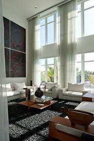 Rene Gonzalez Architect Bilzin High Ceiling Living Room Window Treatments Living Room Living Room Windows