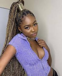 Blonde Knotless Box Braids Knotless Box Braids Blonde Knotless Braids Braids For Black Hair Hair Styles Girls Hairstyles Braids The hair features small braids, loose curls and colorful cords have been used too.