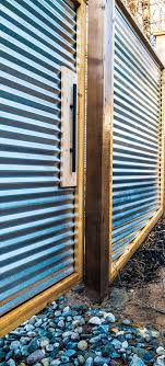 Diy corrugated metal fences project, how to build a fence with tin ceiling tiles. Ram Construction Ramannapolis Com Showcase A New Privacy Fence With Custom Corrugated Metal And Cedar Posts Ram Construction