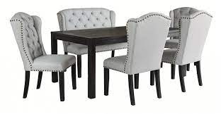 The dining table has four straight legs and a rectangular tabletop. Jeanette Dining Table And 4 Chairs And Bench D702 01 4 08 25 Dining Room Groups Price Busters Furniture