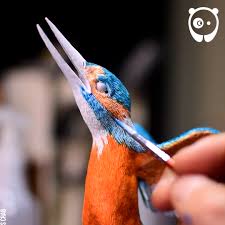 Making DIY kingfisher catching a fish
