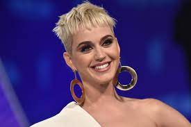 Katy gets barefoot to show off a pair of funky heels at 00:58. Katy Perry Opens Up About Experiencing Depression Teen Vogue