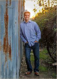 Soccer And Football Senior Pictures By Dallas Photographer Lisa Mcniel Senior Photos Boys Senior Boy Photography Senior Pictures Boys