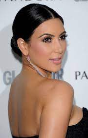 Kim kardashian's hairstyles are on a constant roller coaster ride of style. Kim Hairstyle Classic Low Bun Kim Kardashian Hair Kim Hair Kardashian Hair