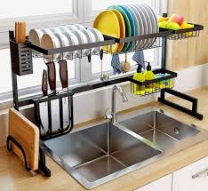 the sink dish drying rack and storage area