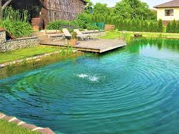 Grosser Schwimmteich Mit Steg Schwimmteich Naturschwimmbecken Gartenpools