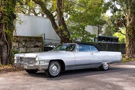 Image result for Starlight Silver 1965 Cadillac