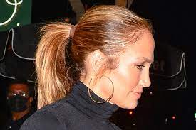 The singer and teen were recently photographed outside of sunset plaza in los angeles. Jennifer Lopez Is Darin In Cutout Strapless Dress See Through Heels Footwear News