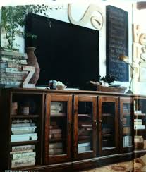 Entertainment Center Tv Stand Using Kitchen Cabinets Knock Out The Panels And Replace With Glass Or Chicken Wire Top With Several Home Home Decor Family Room