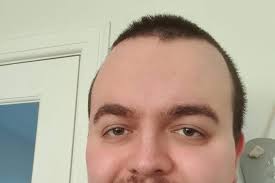 Wrex is my emotional support lizard'