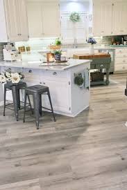 This element alone makes it ideal for use in kitchens, as well as bathrooms and even basements. Updating A Kitchen With Vinyl Engineered Plank Flooring Cutertudor Vinyl Flooring Kitchen Vinyl Plank Flooring Kitchen Kitchen Vinyl