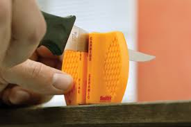 Hold the handle of the sharpener. Hones For The Sharpening Challenged Blade Magazine
