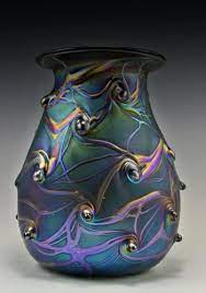 Hundreds of years have actually gone by but flower holders have actually still been made use of as revitalizing decorative pieces. Bohemian Art Deco Glass Vase Iridescent Glass Art Deco Glass Bohemian Art Glass Art