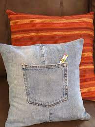 If you don't know how to sew, you can try making a to make a pillow, first cut your fabric into two squares or rectangles that are ½ an inch bigger than you want your pillow to be. How To Make A Throw Pillow Cover With Recycled Jeans Upcycle Jeans Recycled Jeans Denim Pillow