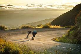 Longboarding is riding on a longboard. How To Ride Downhill On A Longboard Skateboarding Guide