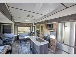 Separate living room private bedroom breakfast bar with stools fireplace full reclining. Keystone Sprinter Limited Rvs Review 4 Fifth Wheels And Travel Trailers Shaw Rv Blog