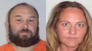 Two people were arrested in Izard County after a probation compliance  check.