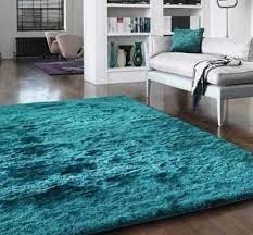 Whisper Teal Rugs Buy Online At Modern Rugs Uk Teal Rug Rugs In Living Room Teal Living Rooms