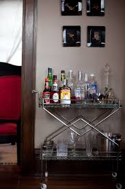 For your bedroom, just stack some books and magazines on the lower shelves and a lamp, candle and bud. Bar Cart Traditional Dining Room Omaha By Birdhouse Design Studio Houzz