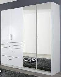 Dahinter befindet sich viel stauraum in diversen fächern, eine kleiderstange ist rechts verfügbar. Kleiderschrank 4 Trg Schrank Spiegel Schubkasten Schlafzimmer Weiss Hochglanz Ebay