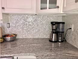 White Herringbone Mother Of Pearl Tile As Kitchen Backsplash Herringbone Mosaic Tile Pearl Tile Kitchen Tiles Backsplash