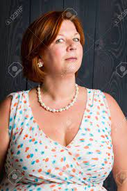 Woman In Her Forties, Giving A Funny Naughty Look To The Camera Stock  Photo, Picture and Royalty Free Image. Image 90381480.
