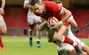 England's anthony watson is tackled by wales' jonathan davies and george north last month (photo by laurence griffiths/getty. Jrfe Bxg0biunm