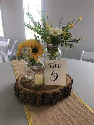 Rustic Centerpiece Using Mason Jars Sunflowers Greenery W Wedding Centerpieces Mason Jars Sunflower Wedding Decorations Sunflower Wedding Centerpieces