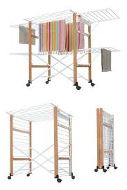 le sechoir a linge en bois massif sur roulettes gulliver foppapedretti offre une grande capacite de sechag sechoir a linge etendoir a linge organisation maison