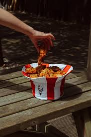 Kfc Just Dropped A Limited Edition Bucket Hat Which You Can Also Put Your Chicken In Kfc Food Bucket Hat
