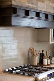 As opposed to mosaic tiles, which tend to be small and require grout covering a far greater percentage of the surface, these tiles are big and elegant, and they create a more continuous feel, with simple lines. Considering A Natural Stone Backsplash In The Kitchen Read This First Designed