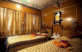 The Palace On Wheels With Its Cream Colored Livery Is A Joint Venture Of Indian Railways And The State Of Rajasthan S Luxury Train Train Travel Luxury Tours