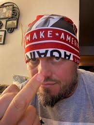 Looks like a toddler just trying to learn how to flip the bird.