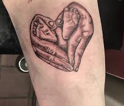 See more ideas about tattoos, baby footprint tattoo, footprint tattoo. Hands Holding Baby Feet Flesh Ideas Tattoo Piercing Facebook