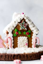 How To Make A Beautiful And Simple Homemade Gingerbread House With Royal Icing And Gingerbread House Recipe Homemade Gingerbread House Halloween Cookie Recipes