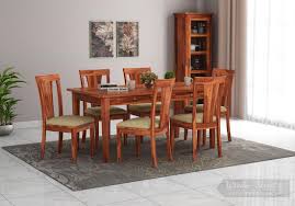 This dining table and its natural wood grain finish completes your dining room's look no matter the style. Buy Mcbeth Storage 6 Seater Dining Table Set Honey Finish Online In India Wooden Street
