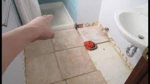 This is a good method to give your bathroom a strong accent. Bathroom Demo Floor Tile Small Bathroom Remodel Youtube