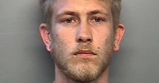 Hearing delayed for man charged in Indiana officer's slaying