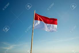 In indonesian, this flag is called sang saka merah putih. Indonesia Flag Under Blue Sky Stock Photo Picture And Royalty Free Image Image 128189811