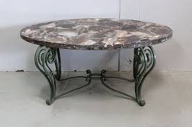 Resembling antique trunk with stylish iron fitting, it hides ample of space for wine and bar accessories storage, being simultaneously a cocktail table. Marble And Wrought Iron Coffee Table 1950 For Sale At Pamono