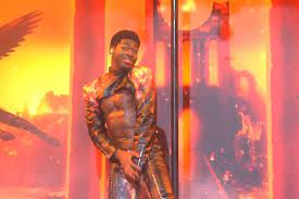 In the visual, the artist at one point pole dances down to hell. Lil Nas X Splits His Pants While Performing On Snl Xxl